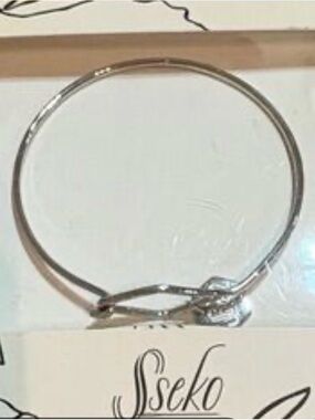 African Artisan Silver Brave Bangle Bracelet